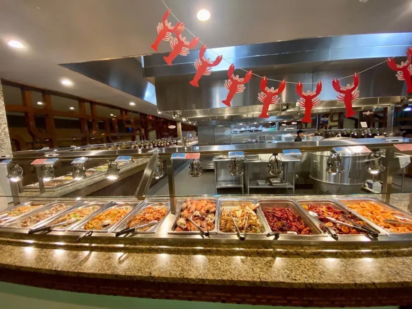 Fresh seafood station with crawfish and crab at Feast Buffet